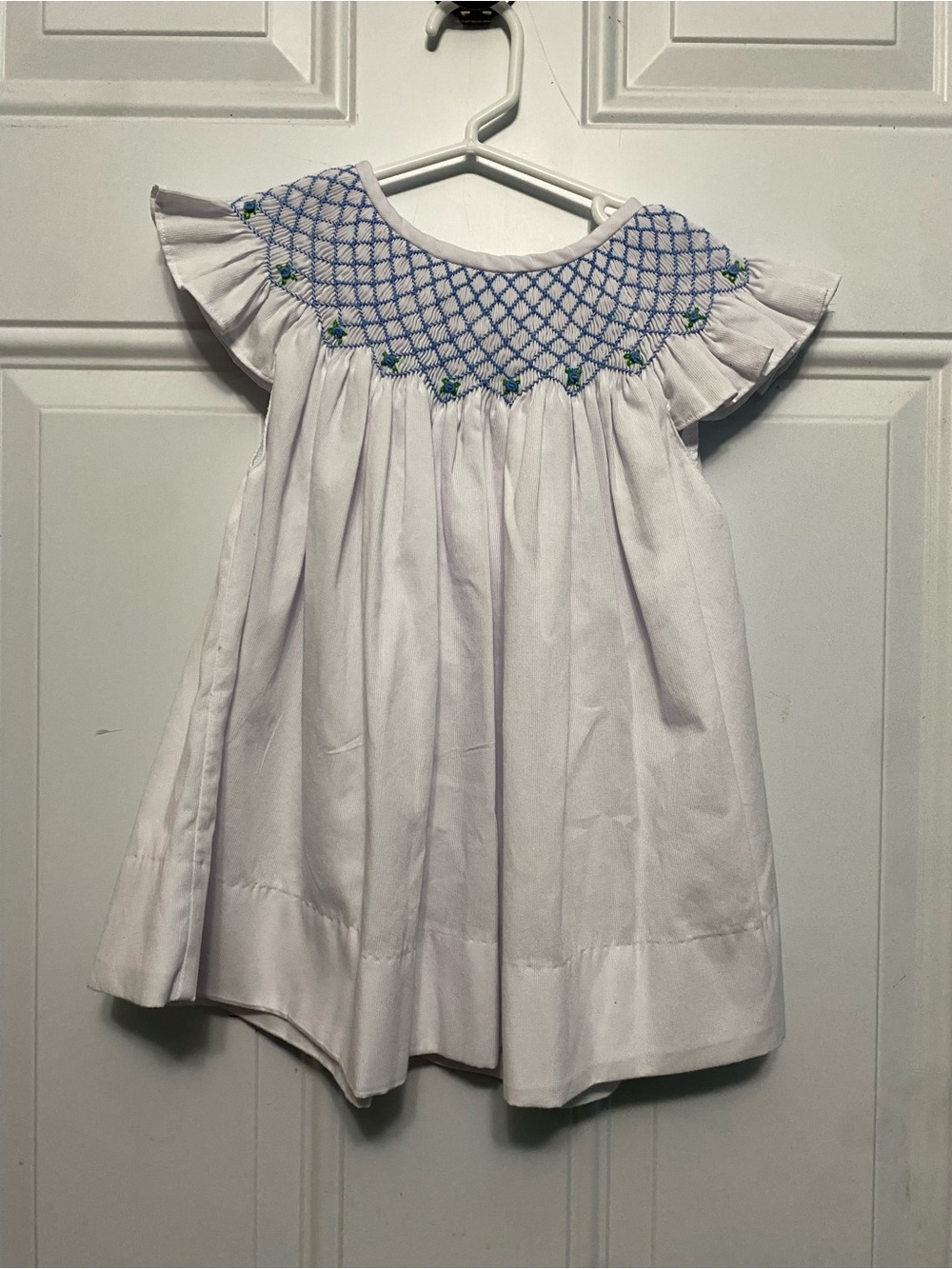 White Girls Smocked Flutter-Sleeve Dress with Blue Accents